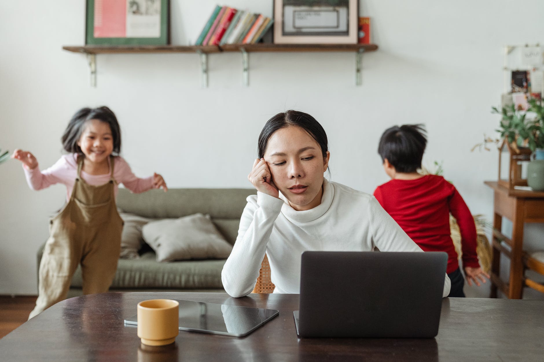 A stressed out parent feeling overwhelmed and drained